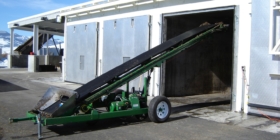 conveyor loading compost vessel