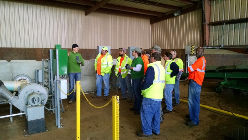 ECS employee trains a group of new operators.