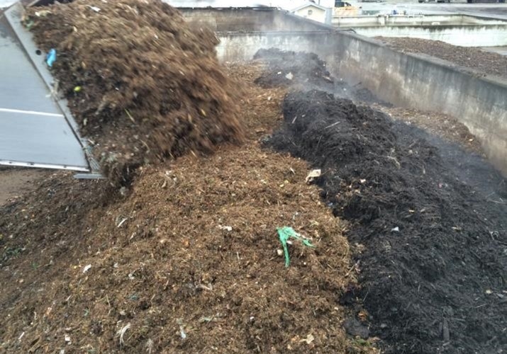 compost being covered with biolayer cover