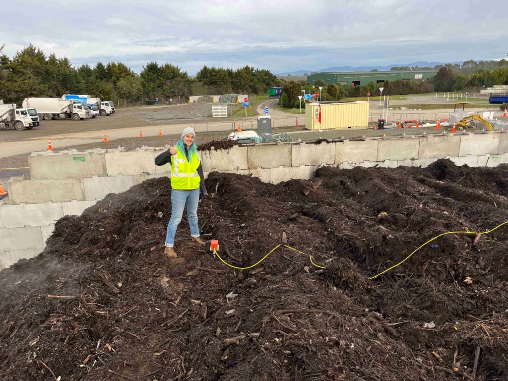 engineer inspecting  compost pile