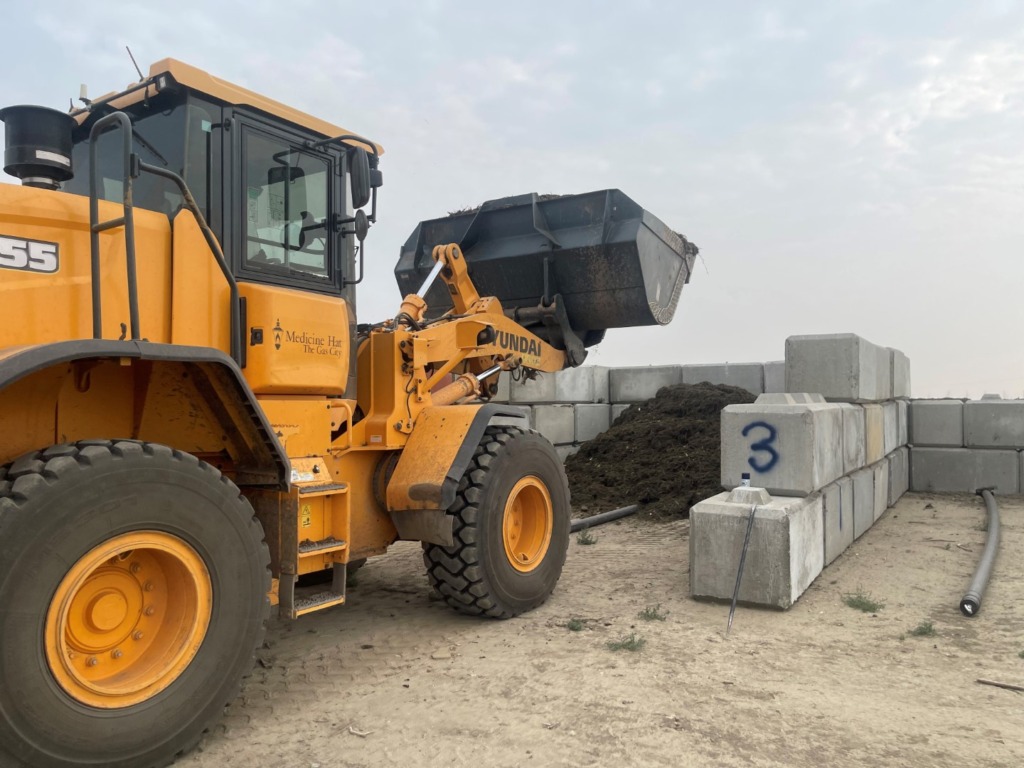 loader filling compost zone